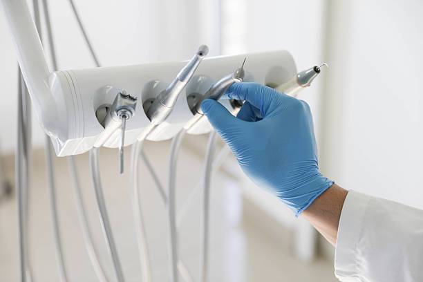 Professional Tooth Extraction technician working in Marcellus, MI